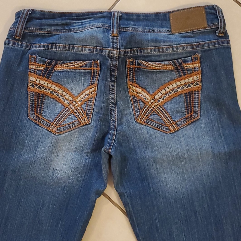 **7 For $25 Skinny jeans w/ embroidery on pockets
